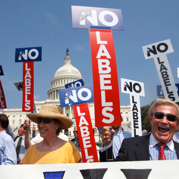 FILE - John Holman, of Denver, Colo., right, and others with the group "No Labels" take part in a rally on Capitol Hill in Washington, July 18, 2011. North Carolina voters could have another presidential ticket to choose from in 2024 now that state election officials have formally granted the “No Labels” movement a spot on the ballot. The State Board of Elections voted 4-1 on Sunday, Aug. 13, 2023, to recognize the No Labels Party as an official North Carolina party following a successful petition effort. (AP Photo/Jacquelyn Martin, File)