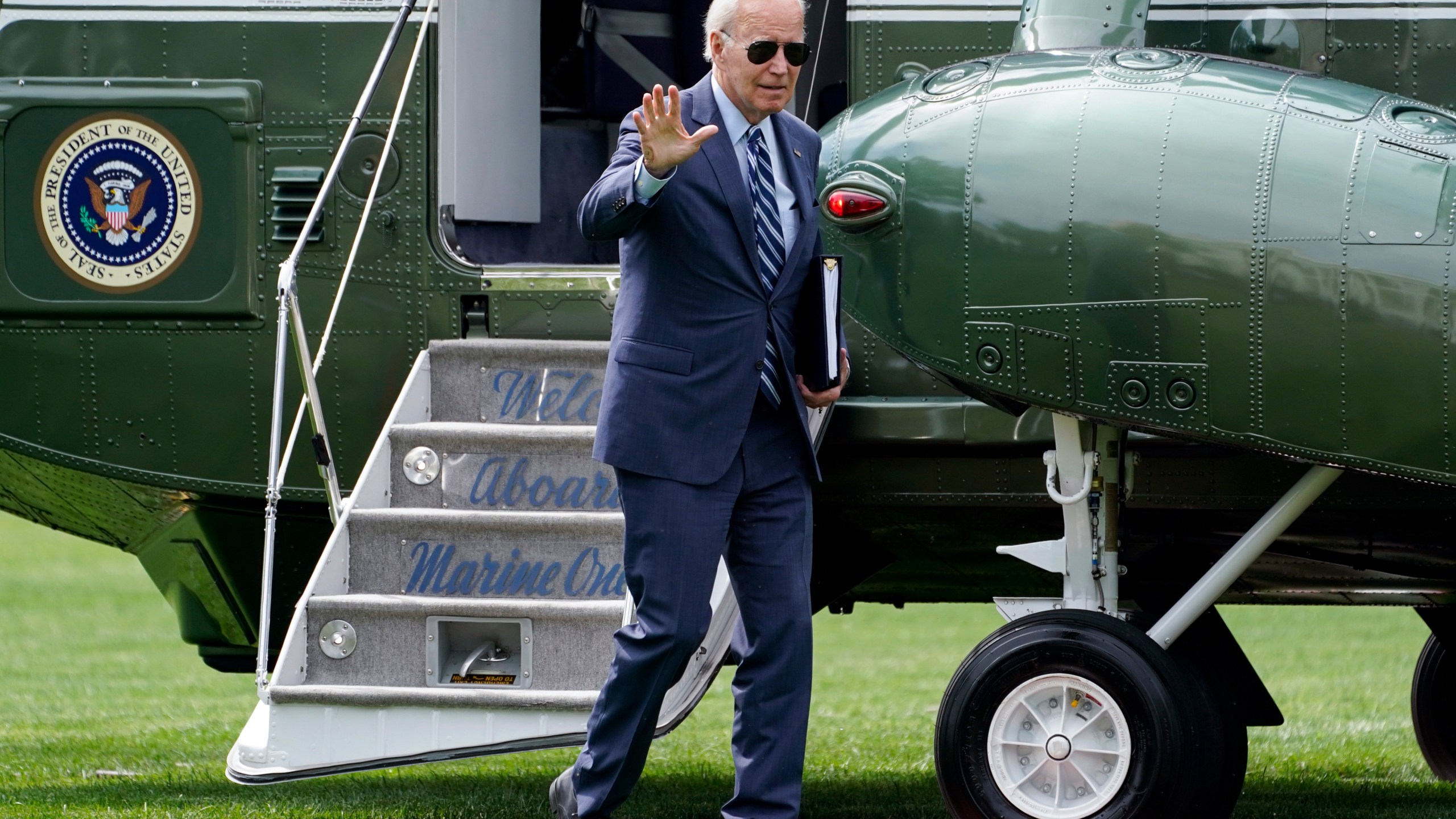 President Joe Biden waves as he arrives on the South Lawn of the White House, Monday, Aug. 14, 2023, in Washington. (AP Photo/Evan Vucci)