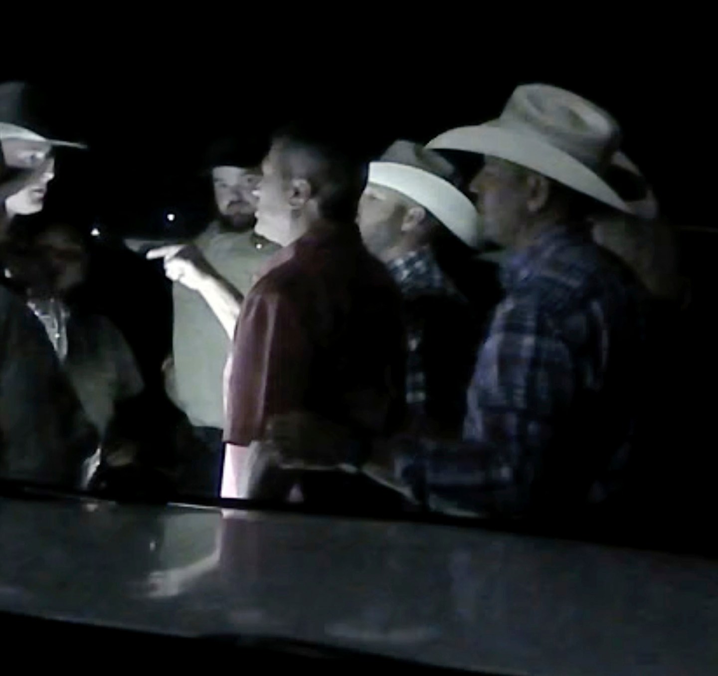 In this screen grab from body camera footage released by The Texas Department of Public Safety on Monday, Aug. 14, 2023, U.S. Rep. Ronny Jackson of Texas is seen arguing with officers outside a rodeo near Amarillo, Texas, in July. The video shows Jackson being taken to the ground by officers and profanely berating them. The congressman later said he was trying to help a person who needed medical care before officers intervened. (The Texas Department of Public Safety via AP)